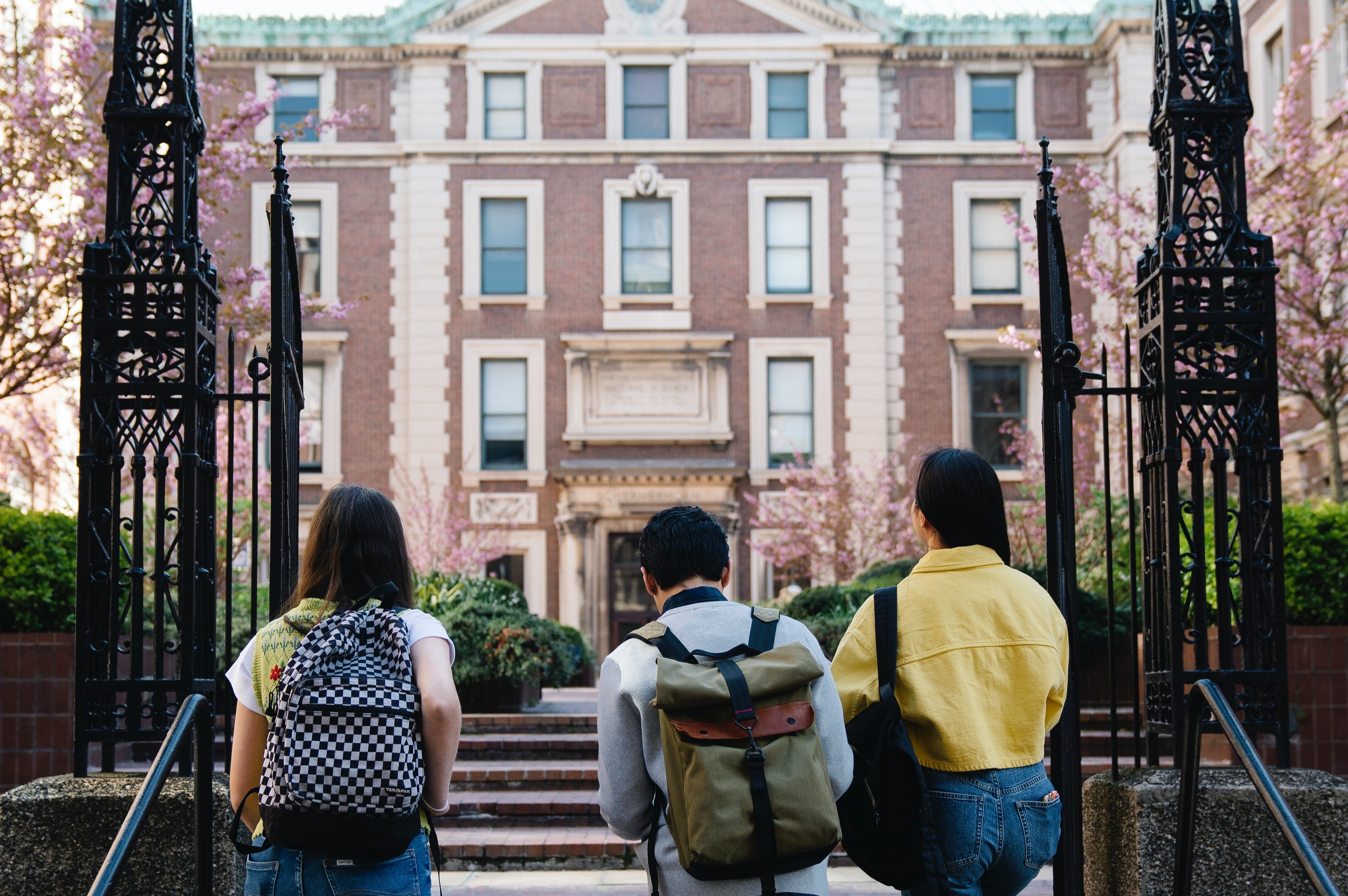 students walking into campus